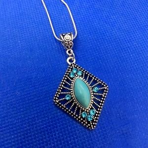 Turquoise color necklace pendant on 18" chain